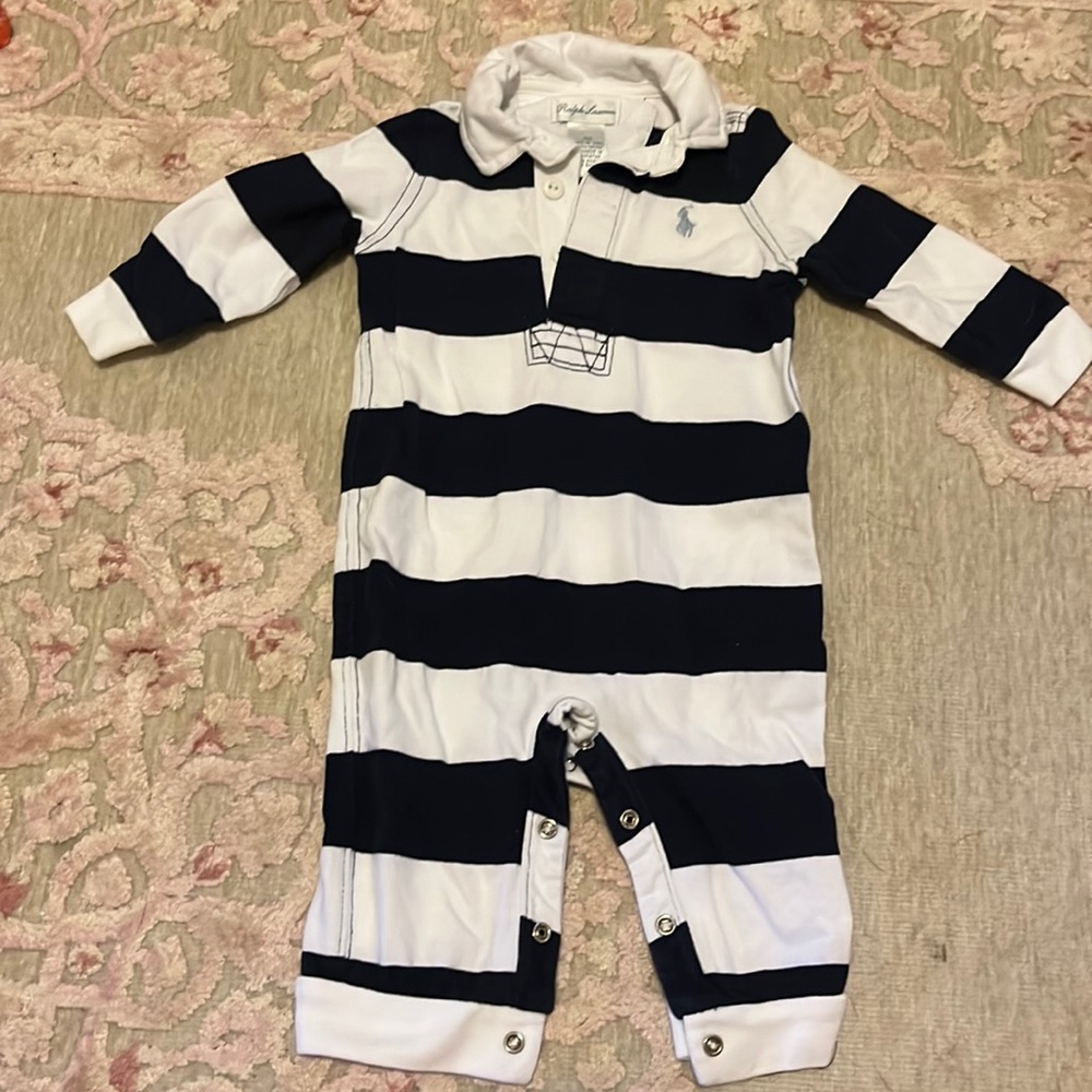 Navy blue and white striped. Size 6M.
